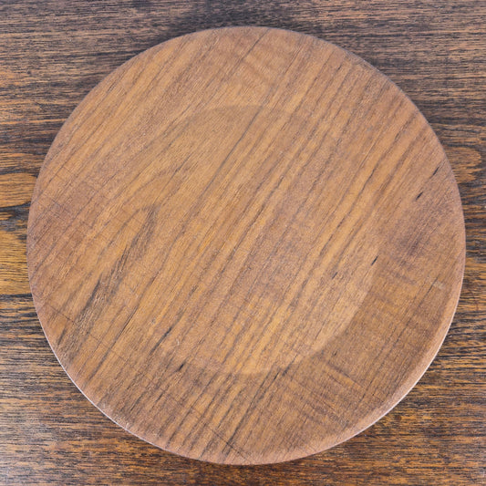 Set de 7 sous assiettes en teck, Danemark, 1960 – vue de profil – en teck, céramique – Danemark, années 1960 – Atelier 56